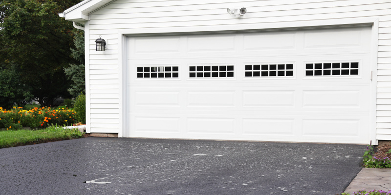 Garage Door Repair Cost vs. Replacement Cost